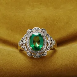 photo of #5 silver ring with green gem