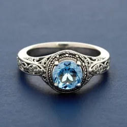 photo of #6 silver ring with light blue gem