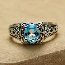 photo of #6 silver ring with light blue gem
