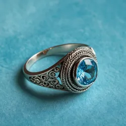 photo of #6 silver ring with light blue gem