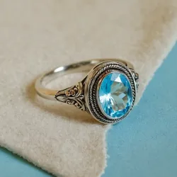 photo of #6 silver ring with light blue gem