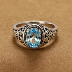 photo of #6 silver ring with light blue gem