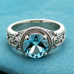 photo of #6 silver ring with light blue gem