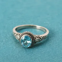photo of #6 silver ring with light blue gem