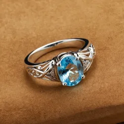 photo of #6 silver ring with light blue gem