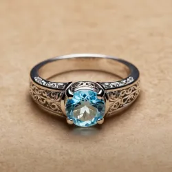 photo of #6 silver ring with light blue gem