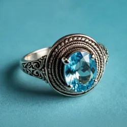 photo of #6 silver ring with light blue gem