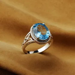 photo of #6 silver ring with light blue gem