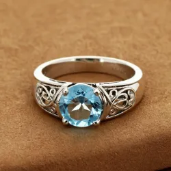 photo of #6 silver ring with light blue gem