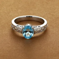 photo of #6 silver ring with light blue gem