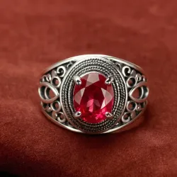 photo of #7 silver ring with light red gem