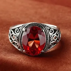 photo of #7 silver ring with light red gem