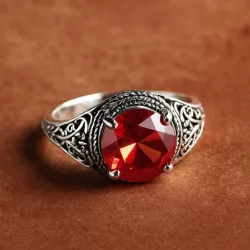 photo of #7 silver ring with light red gem