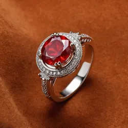 photo of #7 silver ring with light red gem