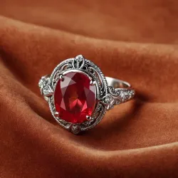 photo of #7 silver ring with light red gem