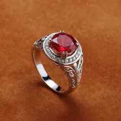 photo of #7 silver ring with light red gem