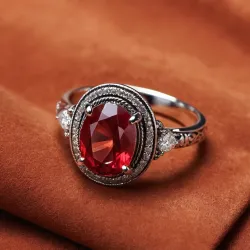 photo of #7 silver ring with light red gem
