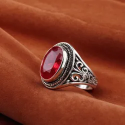 photo of #7 silver ring with light red gem