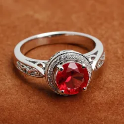 photo of #7 silver ring with light red gem