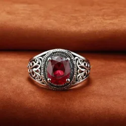 photo of #7 silver ring with light red gem