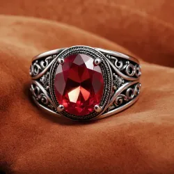 photo of #7 silver ring with light red gem