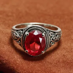 photo of #7 silver ring with light red gem