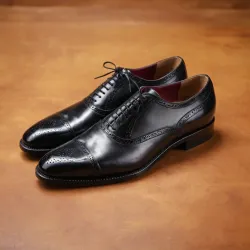 photo of #4 black oxfords