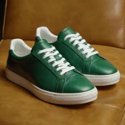 photo of #6 green sneakers