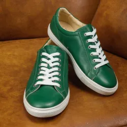 photo of #6 green sneakers