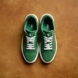 photo of #6 green sneakers