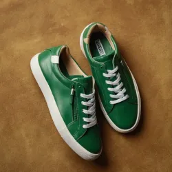 photo of #6 green sneakers