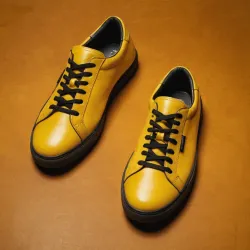 photo of #8 yellow sneakers black sole